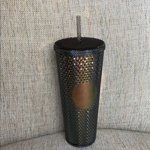 Starbucks plastic studded drink cup.